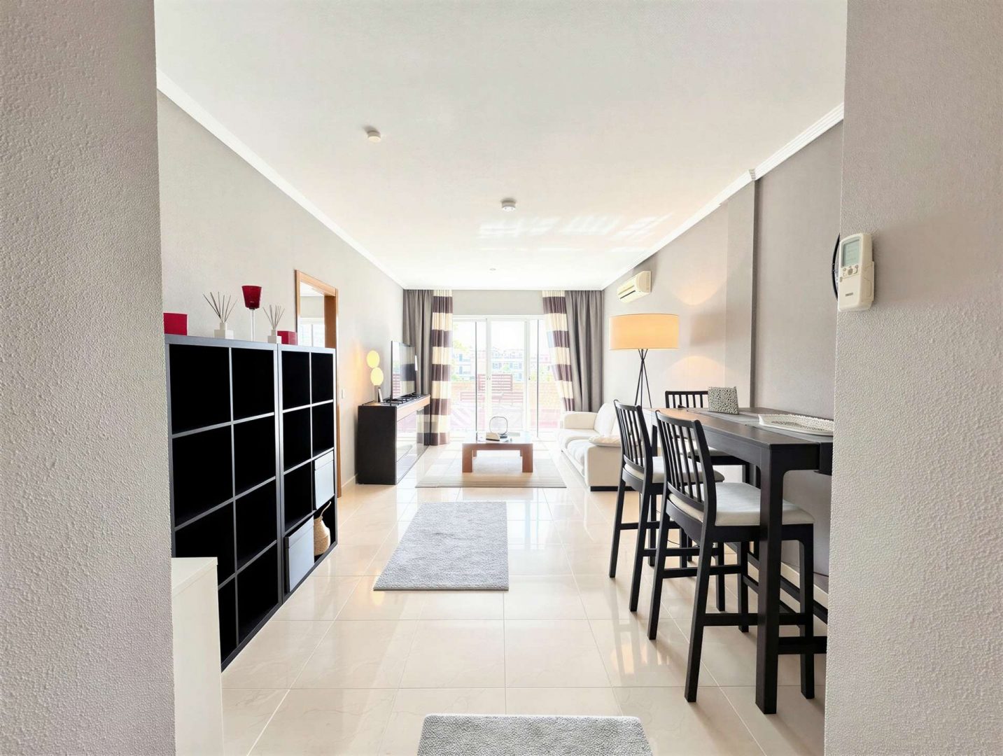 Living Room with Balcony Access