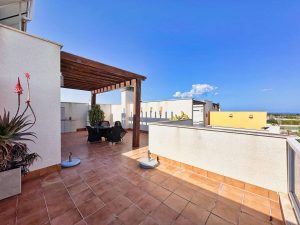 A private rooftop terrace with sea views