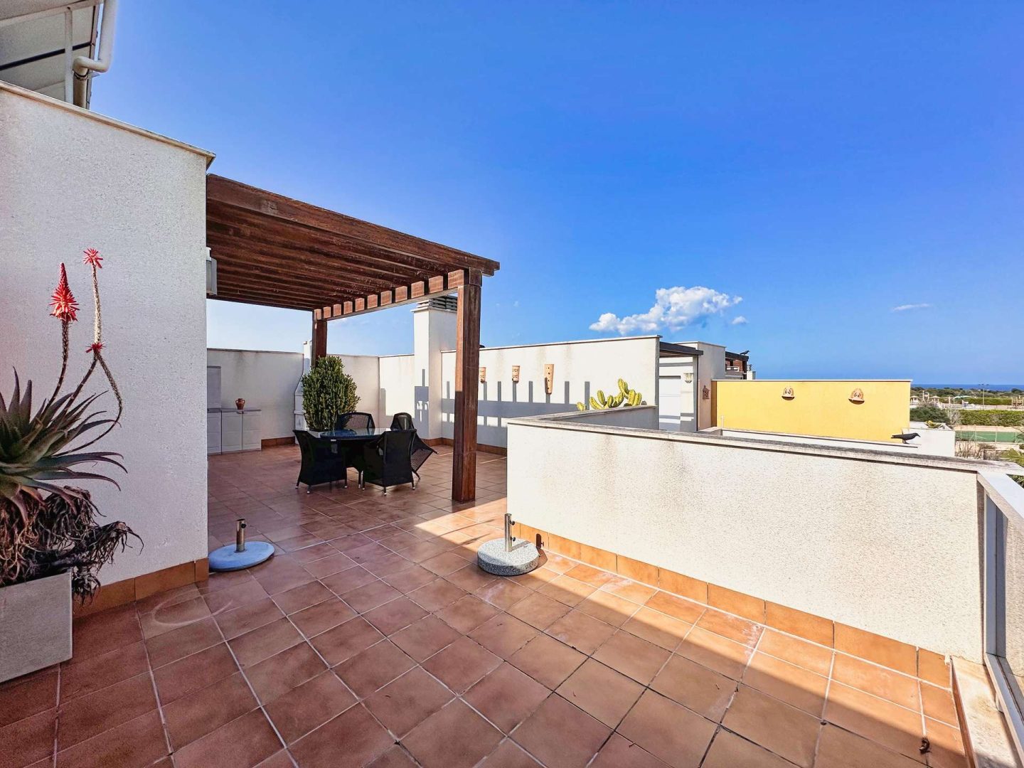 A private rooftop terrace with sea views