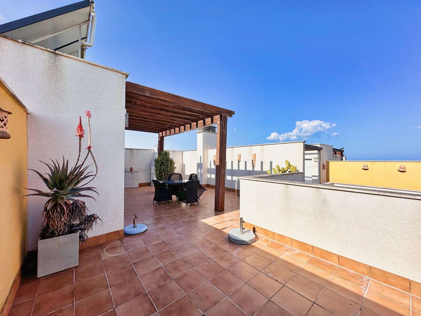 A private rooftop terrace with sea views